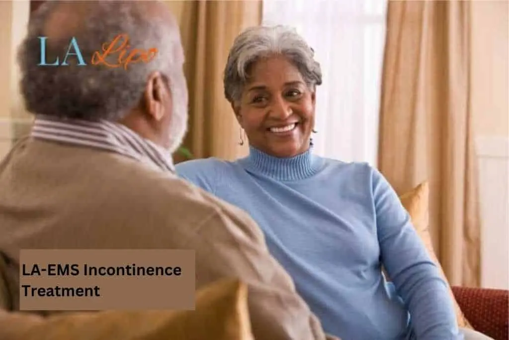 Couple sat smiling at each other - LA-EMS treatment Cheshire