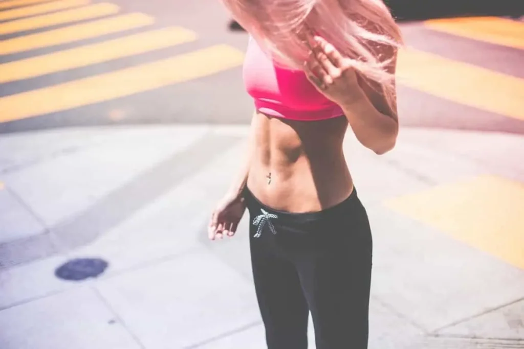 Woman with toned stomach after LA-EMS Body Sculpting Treatment Cheshire 